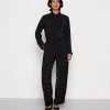 Moves KIT Jumpsuit Black Damen